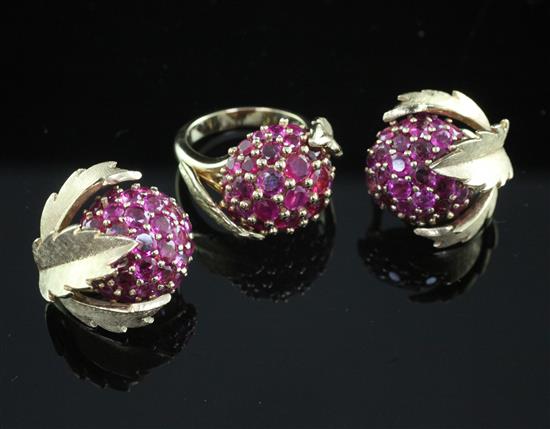 A modern 18ct gold and ruby cluster dress ring and a similar pair of gold ear clips, ring O.